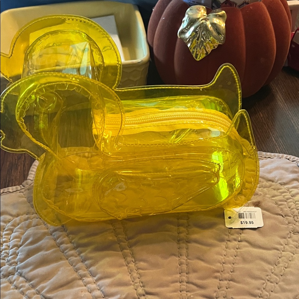 Yellow Duck-Shaped Transparent Pouch by bbw it’s too small for me